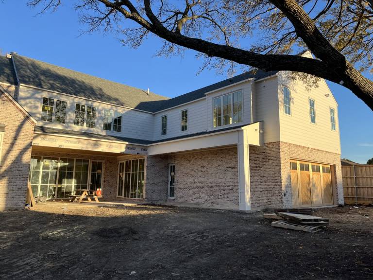 Back of a finished home with new exterior paint