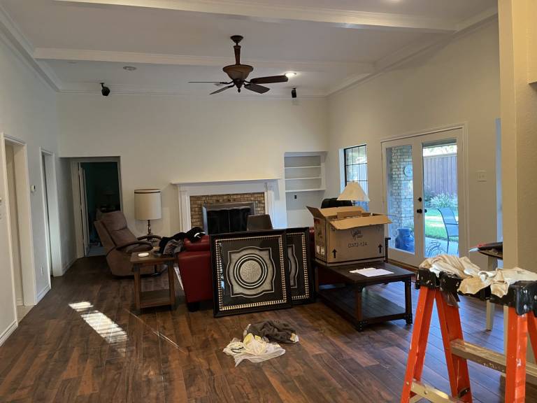Finished living room remodel with new drywall and paint